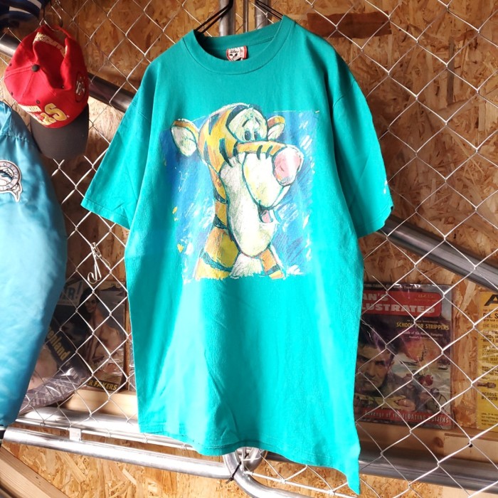 Disney   90s   USA製　ティガー　ビッグプリント　Tシャツ　半袖  人気カラー　グリーン　ヴィンテージ　くまのプーさん　アメキャラ　アメカジ　ストリート　ユニセックス　一点物　古着 | Vintage.City Vintage Shops, Vintage Fashion Trends