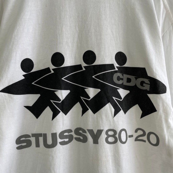 STUSSY ✖️ CDG sarfman backprint T-shirt size M 配送C ステューシー　サーフマン　バックプリントTシャツ　白 | Vintage.City 古着屋、古着コーデ情報を発信